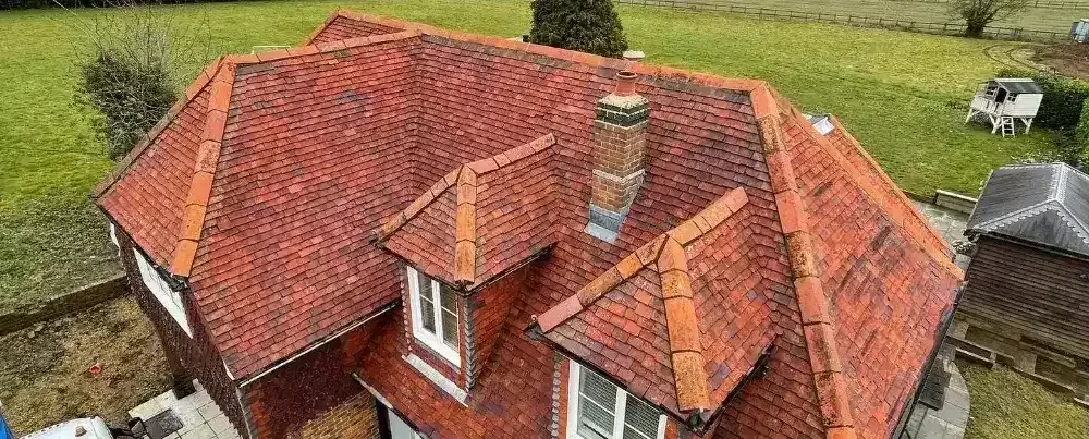 Drone image showing a fully cleaned roof after professional treatment by Neptune Window Cleaning’s roof cleaning team.